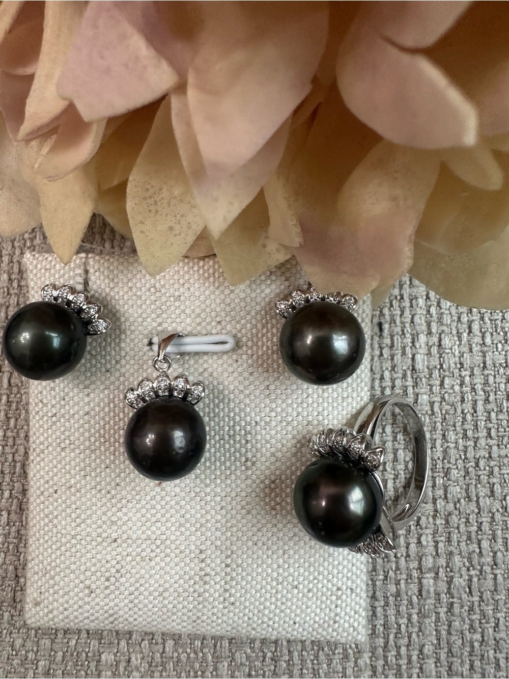 Authentic black south  sea pearl set in micron settings.. pearls size 12mm